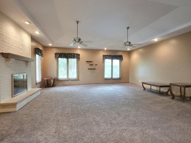 10160 Lancaster Dr, Mokena, IL 60448 - unfurnished living room featuring carpet, a ceiling fan, a fireplace, baseboards, and recessed lighting