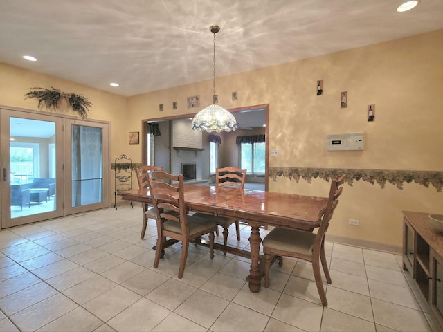 10160 Lancaster Dr, Mokena, IL 60448 - dining room featuring a chandelier, light tile patterned flooring, and recessed lighting