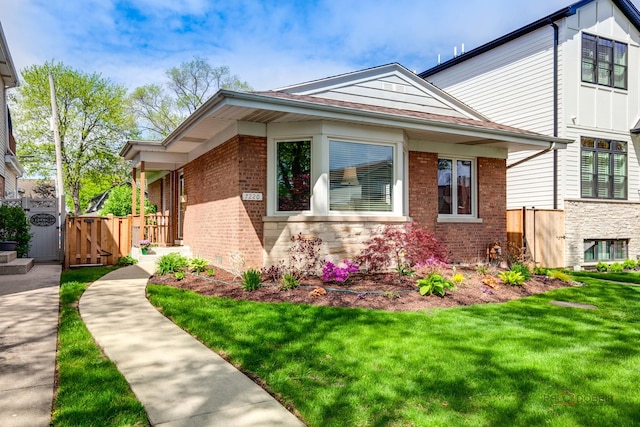 7220 W Ibsen St, Chicago, IL 60631 - view of front of house featuring a gate and brick siding
