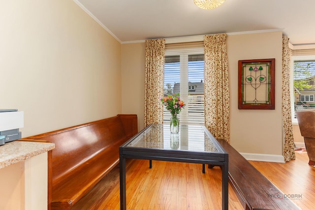 7220 W Ibsen St, Chicago, IL 60631 - dining space featuring wood finished floors, crown molding, and baseboards