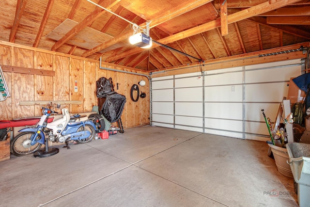7220 W Ibsen St, Chicago, IL 60631 - garage featuring a garage door opener