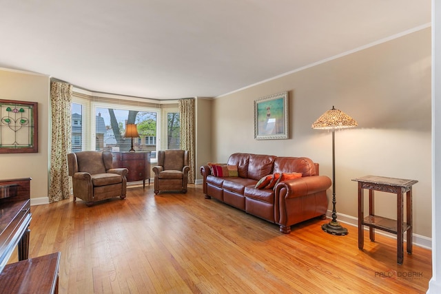 7220 W Ibsen St, Chicago, IL 60631 - living area with ornamental molding, light wood-style floors, and baseboards