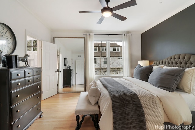 623 Broadway St, Libertyville, IL 60048 - bedroom featuring a ceiling fan, multiple windows, ornamental molding, and light wood-type flooring