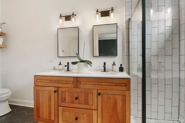 623 Broadway St, Libertyville, IL 60048 - full bathroom featuring double vanity, toilet, a shower stall, and a sink