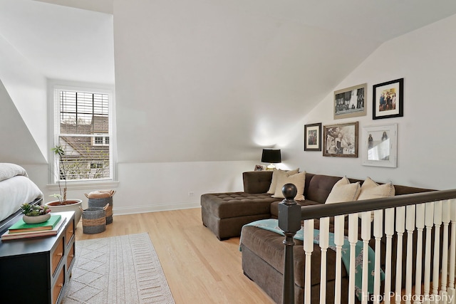 623 Broadway St, Libertyville, IL 60048 - living room featuring baseboards, wood finished floors, and lofted ceiling