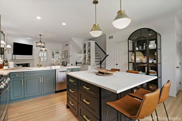 623 Broadway St, Libertyville, IL 60048 - kitchen featuring light countertops, stainless steel appliances, open floor plan, and visible vents