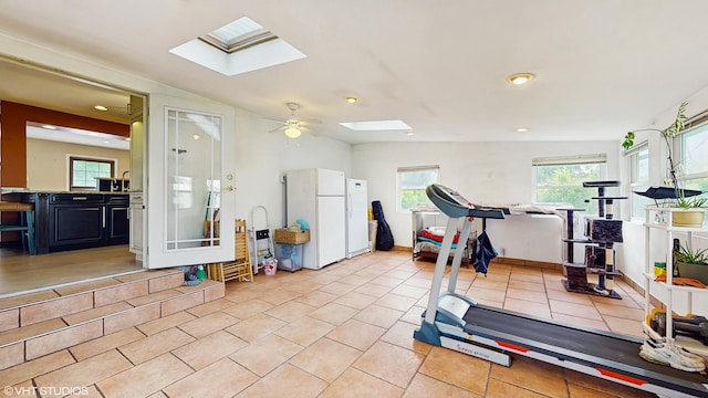 1288 N Ashland Ave, Palatine, IL 60074 - exercise area with a skylight, light tile patterned floors, recessed lighting, and a wood stove