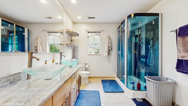 1288 N Ashland Ave, Palatine, IL 60074 - bathroom featuring double vanity, a shower stall, and recessed lighting