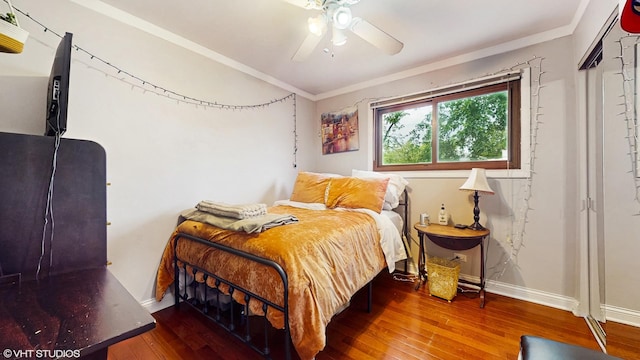 1288 N Ashland Ave, Palatine, IL 60074 - bedroom with wood-type flooring, crown molding, and a ceiling fan