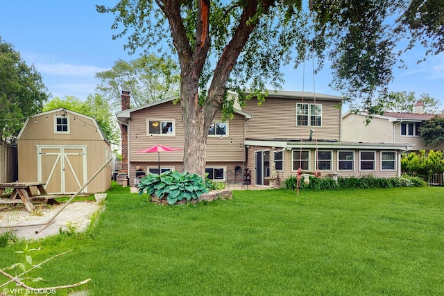 1288 N Ashland Ave, Palatine, IL 60074 - rear view of property featuring a shed and a lawn