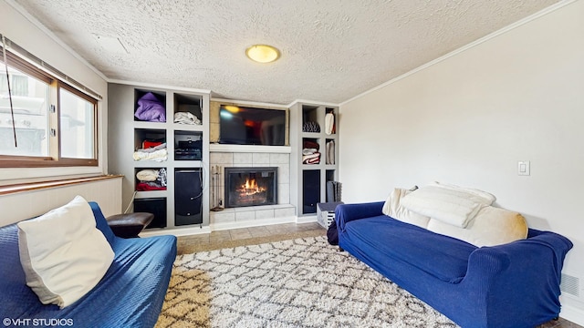 1288 N Ashland Ave, Palatine, IL 60074 - living room with a textured ceiling, built in shelves, a tile fireplace, and ornamental molding