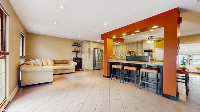 1288 N Ashland Ave, Palatine, IL 60074 - living area with recessed lighting, a ceiling fan, and light wood-type flooring