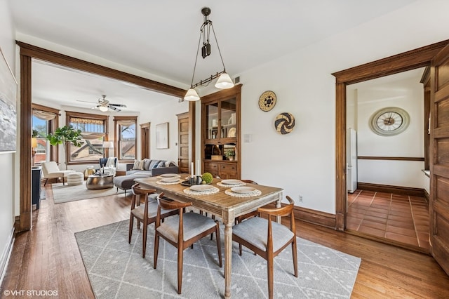 2137 W Cortez St Unit 2, Chicago, IL 60622 - dining room featuring baseboards, light wood finished floors, and ceiling fan