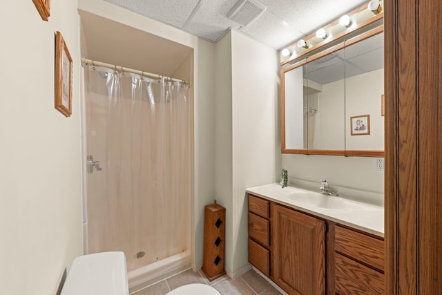 1500 E Lowden Ave, Wheaton, IL 60189 - full bath featuring a shower stall, toilet, tile patterned floors, and vanity