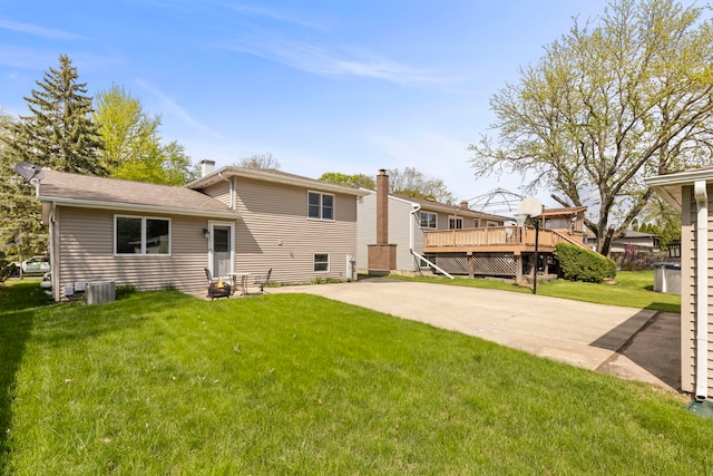 1500 E Lowden Ave, Wheaton, IL 60189 - rear view of property with a wooden deck, a yard, and central AC