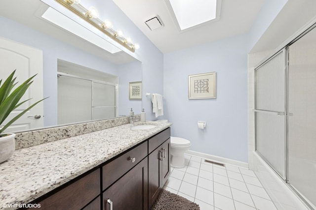 full bathroom featuring visible vents, tile patterned flooring, vanity, baseboards, and toilet