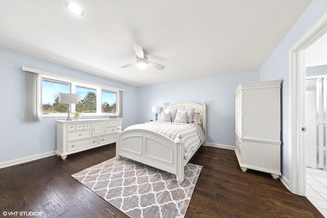 bedroom with visible vents, baseboards, and dark wood-style floors