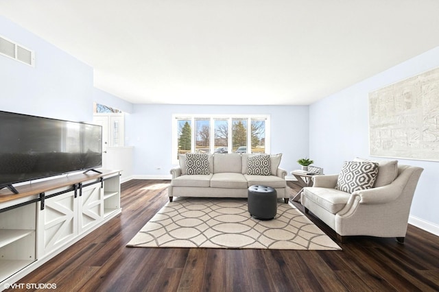 living room featuring baseboards, dark wood finished floors, and visible vents
