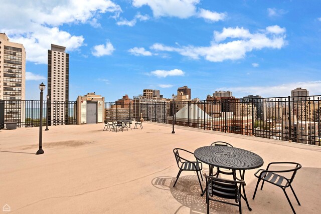 view of patio with a view of city