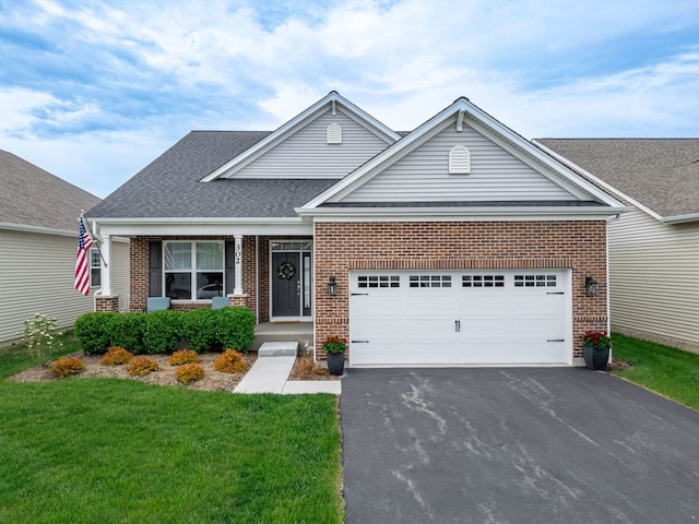302 Links Dr, Addison, IL 60101 - traditional home with brick siding, driveway, a front yard, and a shingled roof