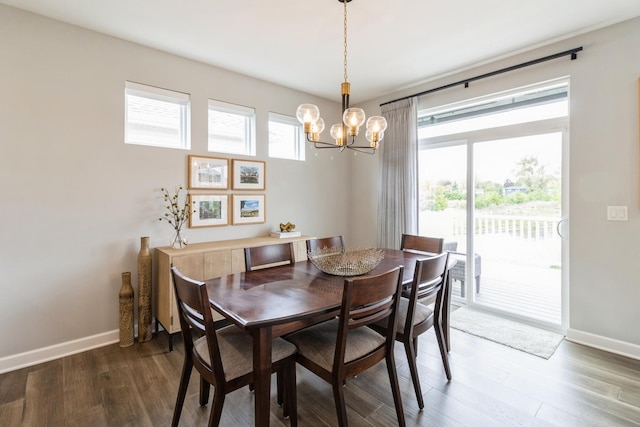 302 Links Dr, Addison, IL 60101 - dining room featuring a chandelier, baseboards, and dark wood-type flooring