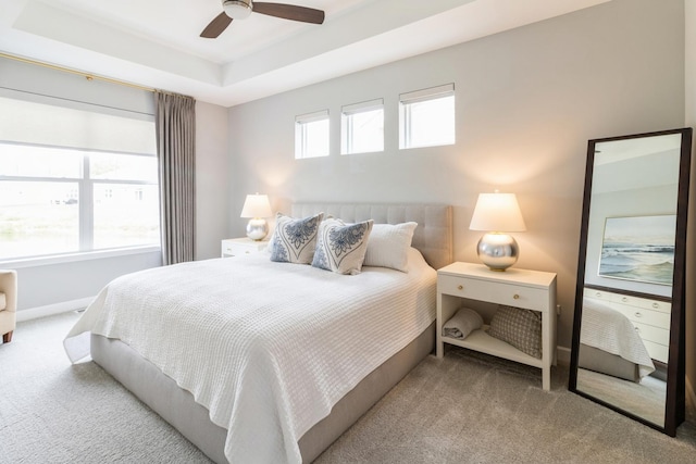 302 Links Dr, Addison, IL 60101 - carpeted bedroom with a raised ceiling, a ceiling fan, and baseboards