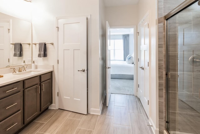 302 Links Dr, Addison, IL 60101 - bathroom featuring a stall shower, vanity, and baseboards