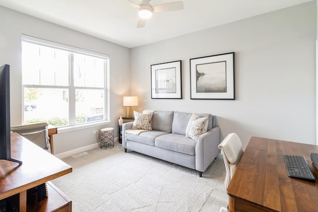 302 Links Dr, Addison, IL 60101 - carpeted living room featuring an office area, a ceiling fan, and baseboards