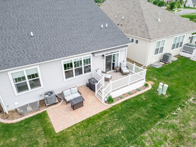 302 Links Dr, Addison, IL 60101 - rear view of property featuring outdoor lounge area, a shingled roof, and central AC unit