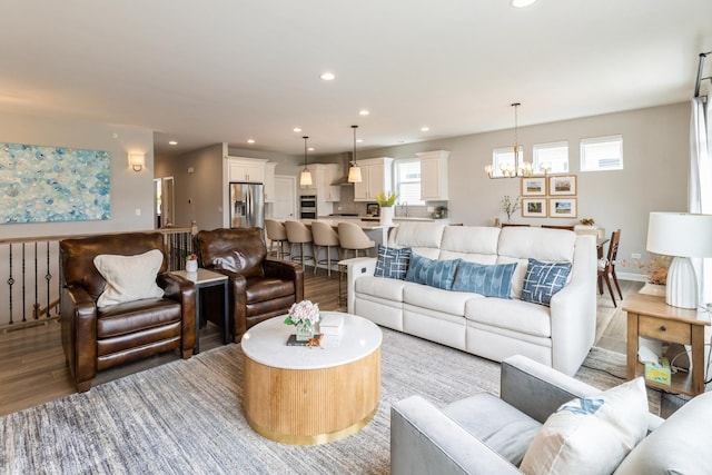 302 Links Dr, Addison, IL 60101 - living room featuring light wood finished floors, a chandelier, and recessed lighting