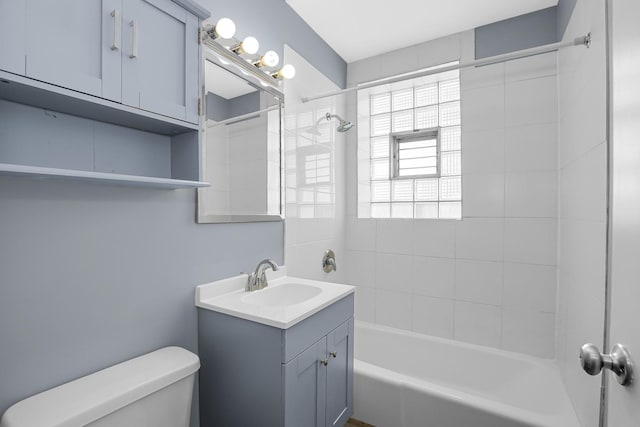 full bathroom featuring toilet,  shower combination, and vanity
