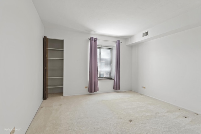 9199 N Rd Unit E, Palos Hills, IL 60465 - carpeted empty room featuring baseboards