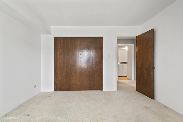 9199 N Rd Unit E, Palos Hills, IL 60465 - unfurnished bedroom featuring washing machine and dryer, carpet flooring, and a closet