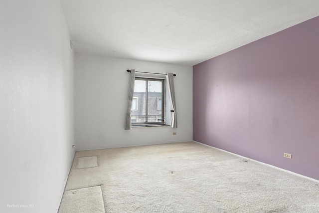 9199 N Rd Unit E, Palos Hills, IL 60465 - spare room featuring carpet flooring and baseboards