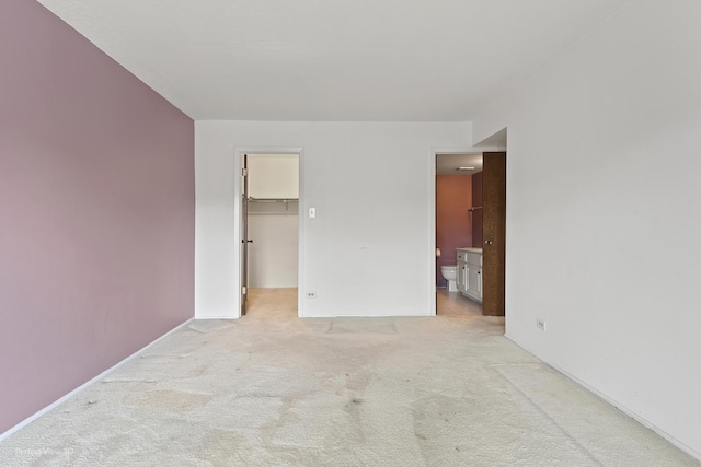 9199 N Rd Unit E, Palos Hills, IL 60465 - unfurnished bedroom featuring carpet, a spacious closet, ensuite bathroom, and a closet