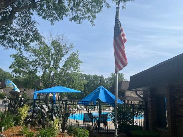 9199 N Rd Unit E, Palos Hills, IL 60465 - view of play area with a community pool