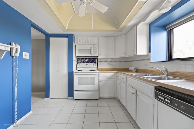 9199 N Rd Unit E, Palos Hills, IL 60465 - kitchen with white appliances, white cabinets, a ceiling fan, light tile patterned floors, and light countertops