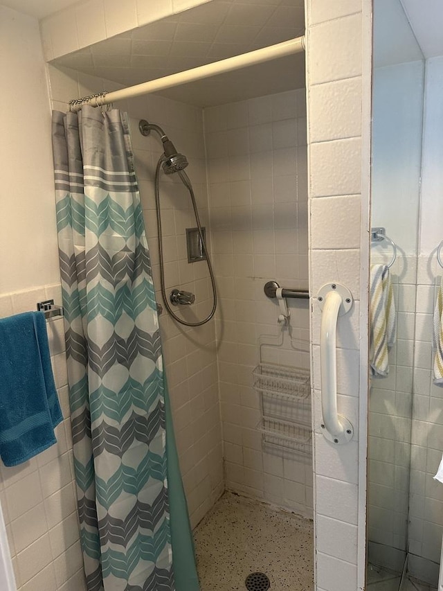 8042 S Bennett Ave, Chicago, IL 60617 - full bathroom featuring a shower stall and speckled floor