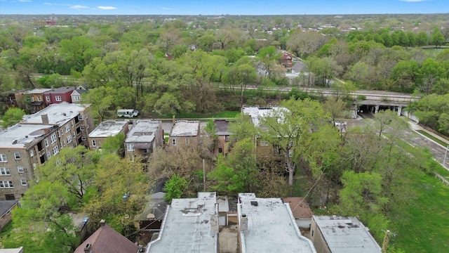 drone / aerial view with a view of trees