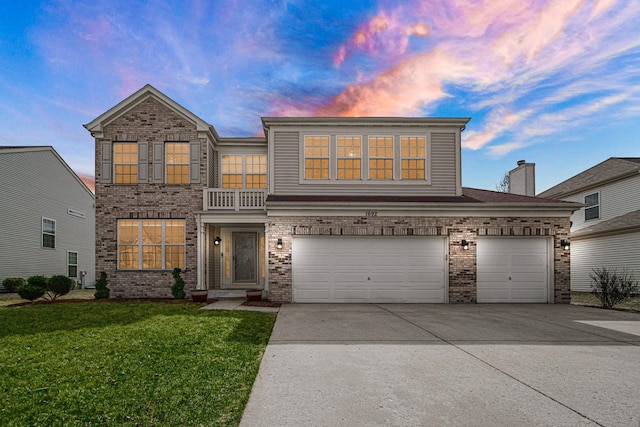 traditional-style house with concrete driveway, brick siding, an attached garage, and a front lawn
