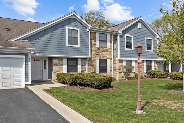 314 Wildberry Ct Unit A1, Schaumburg, IL 60193 - multi unit property with stone siding, driveway, a garage, a front yard, and roof with shingles