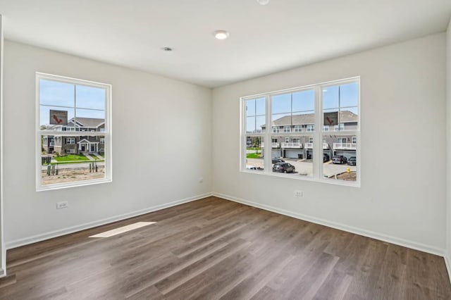 6341 Ulster Dr, Tinley Park, IL 60477 - unfurnished room featuring baseboards and wood finished floors