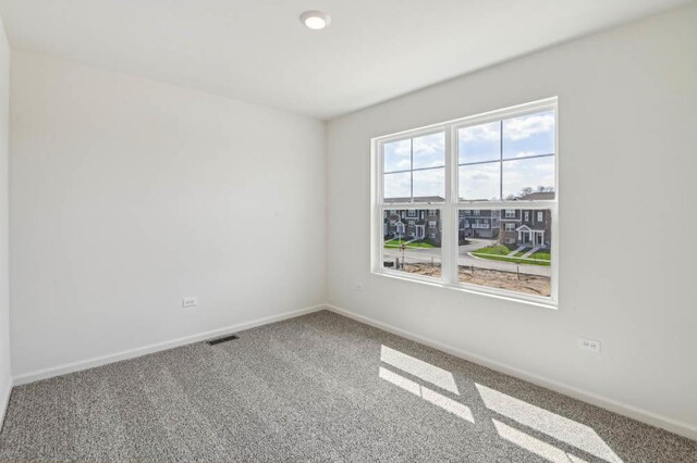 6341 Ulster Dr, Tinley Park, IL 60477 - carpeted empty room with visible vents and baseboards