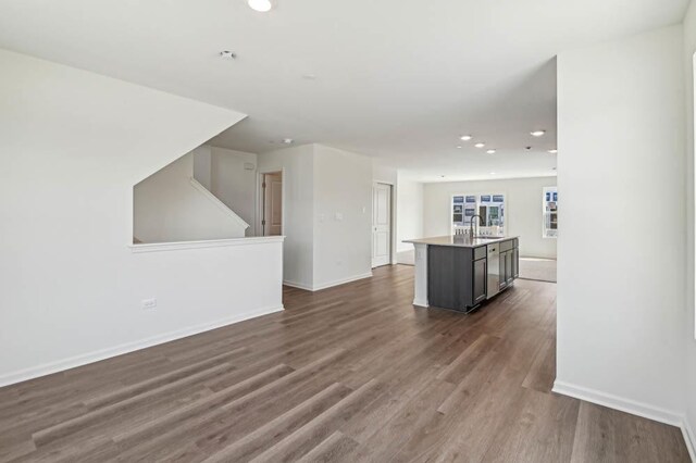 6341 Ulster Dr, Tinley Park, IL 60477 - kitchen with a sink, a center island with sink, recessed lighting, and dark wood-style floors