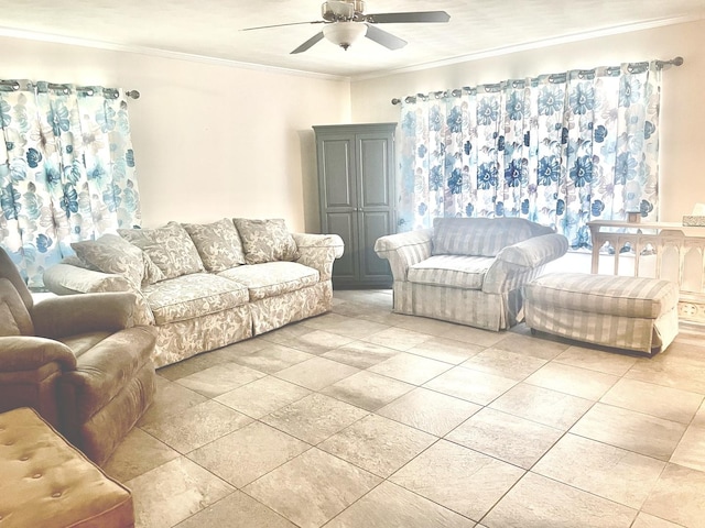 living area with a ceiling fan and ornamental molding
