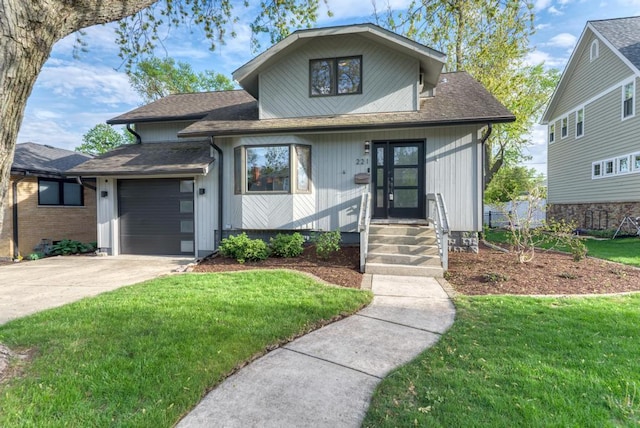 221 8th St, Downers Grove, IL 60515 - view of front of home with an attached garage, driveway, a front lawn, and a shingled roof