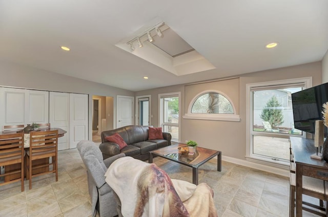 221 8th St, Downers Grove, IL 60515 - living room with plenty of natural light, track lighting, baseboards, and recessed lighting