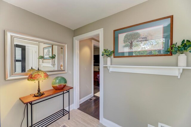 221 8th St, Downers Grove, IL 60515 - corridor featuring wood finished floors and baseboards