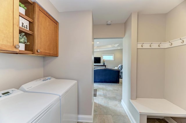 221 8th St, Downers Grove, IL 60515 - laundry area featuring cabinet space and independent washer and dryer