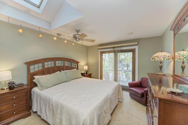 221 8th St, Downers Grove, IL 60515 - bedroom featuring a skylight, access to exterior, carpet, and a ceiling fan